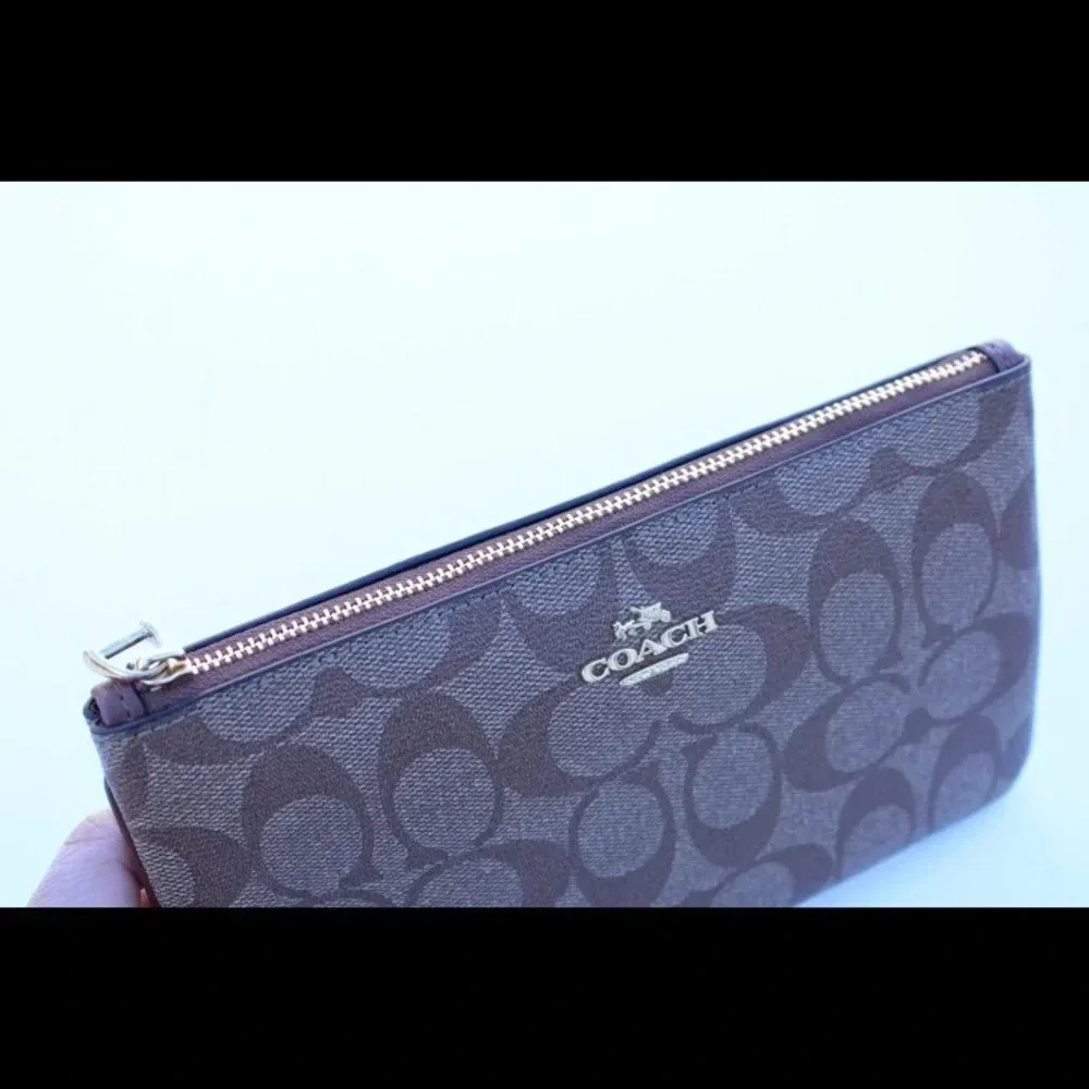 Coach signature logo cluth